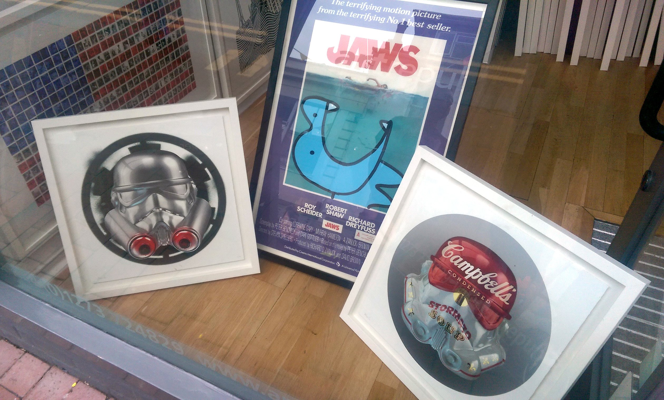 Trooper helmet prints in the artrepublic window, soup can trooper included